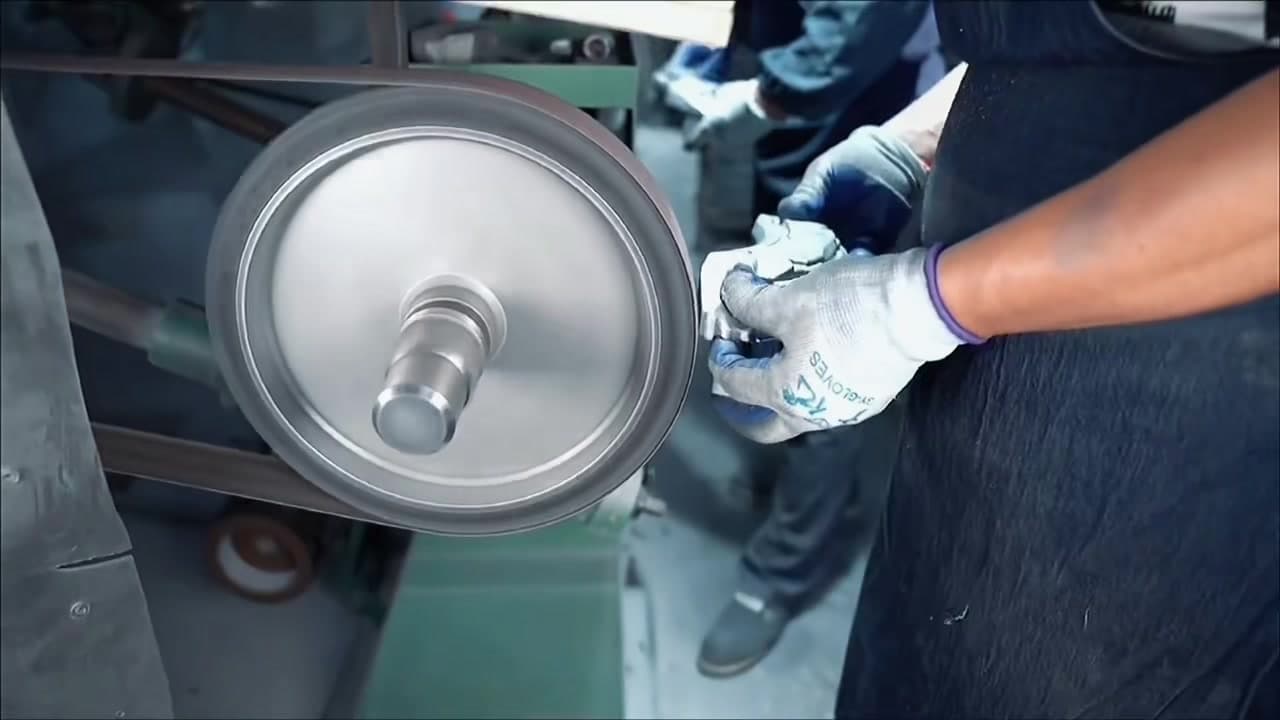 Polishing a decorative brake caliper cover casting