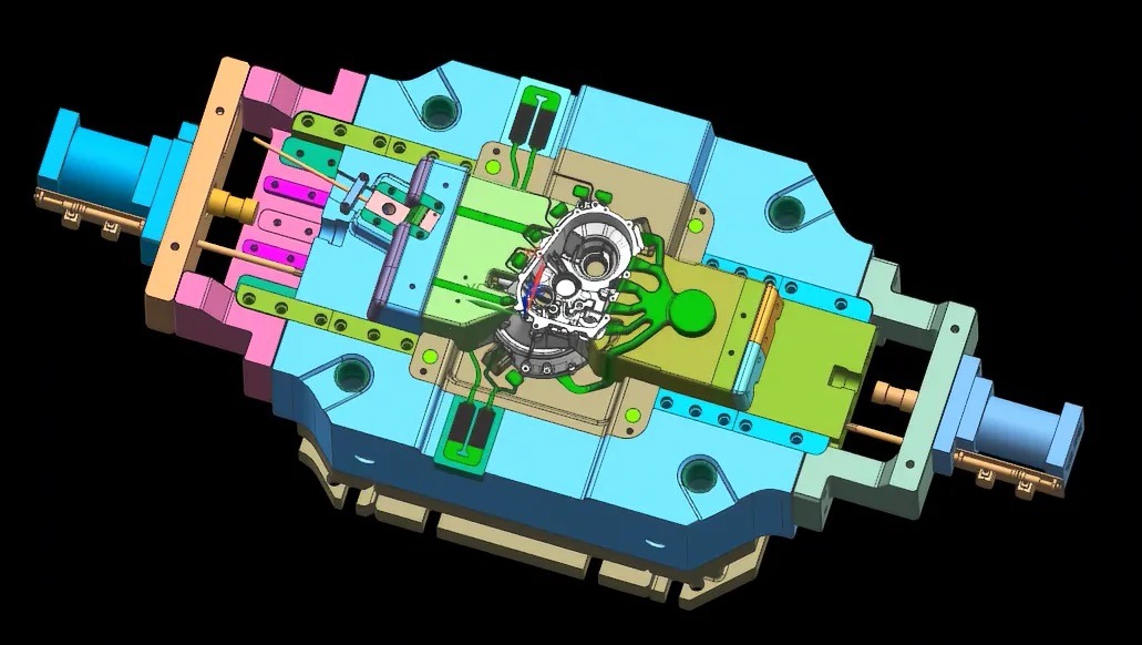 Top view of a die casting tool CAD model with the casting in the cavity and slide mechanisms approaching from multiple directions.