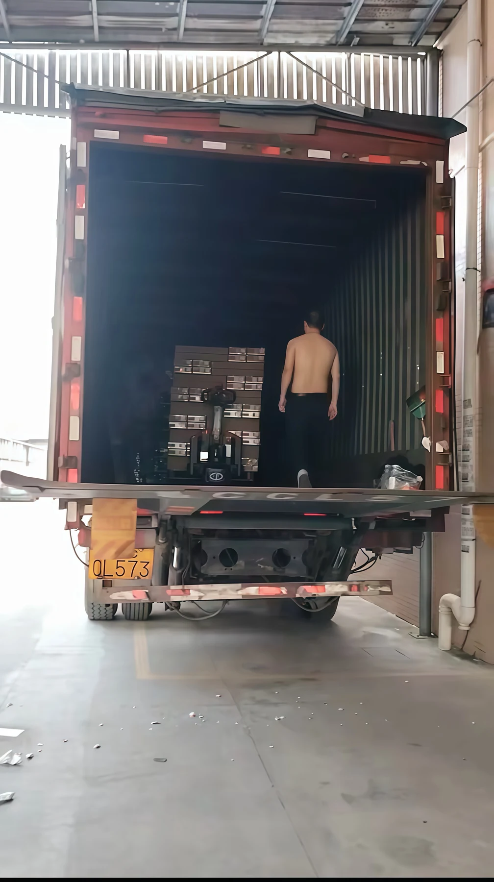 Cartons being loaded into a truck for shipment